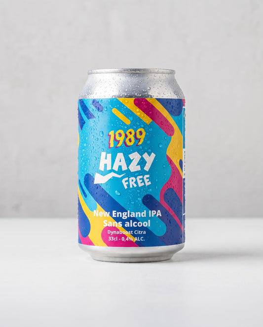 1989 Hazy Free 0.4% NEIPA can front view on concrete background