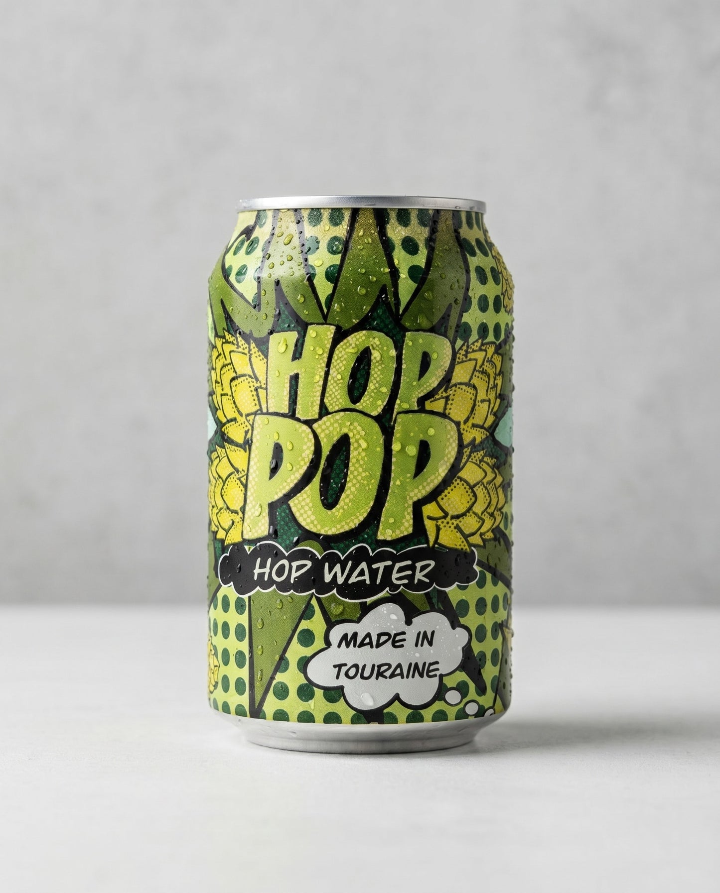 Avant Garde Hop Pop can front view on concrete background