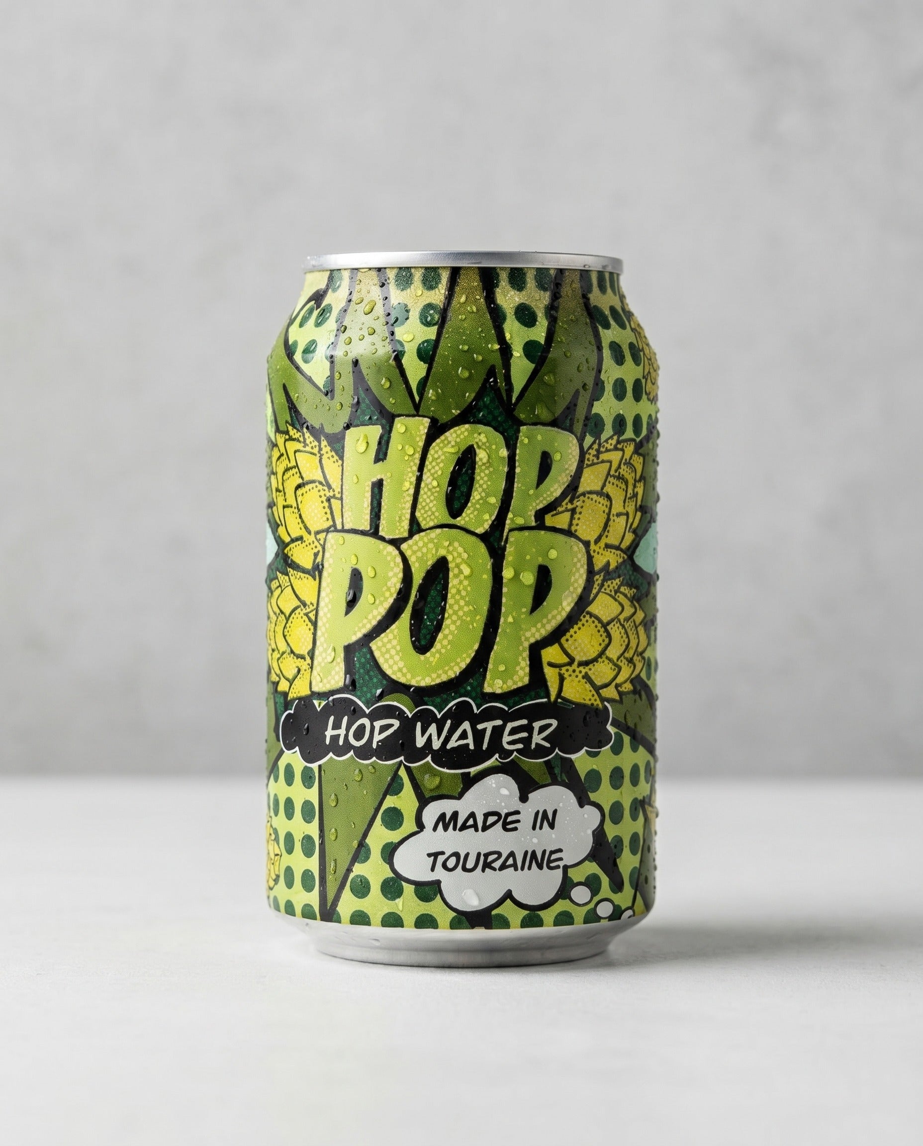 Avant Garde Hop Pop can front view on concrete background
