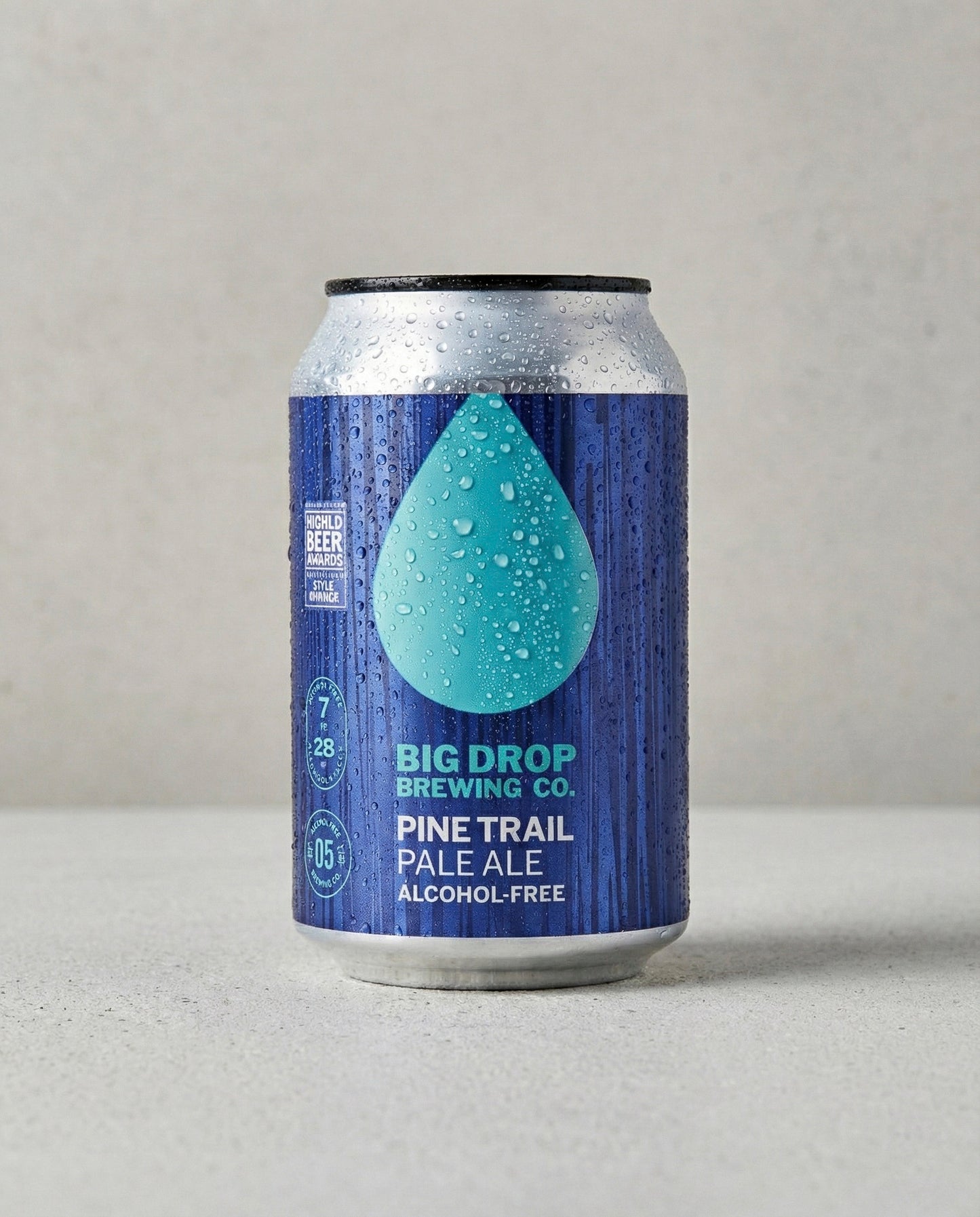 Big Drop Pine Trail Pale Ale can front view on concrete background