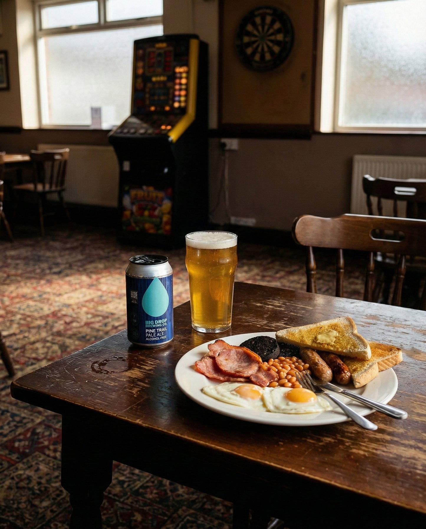 Big Drop Pine Trail Pale Ale on a London breakfast table beside a newspaper