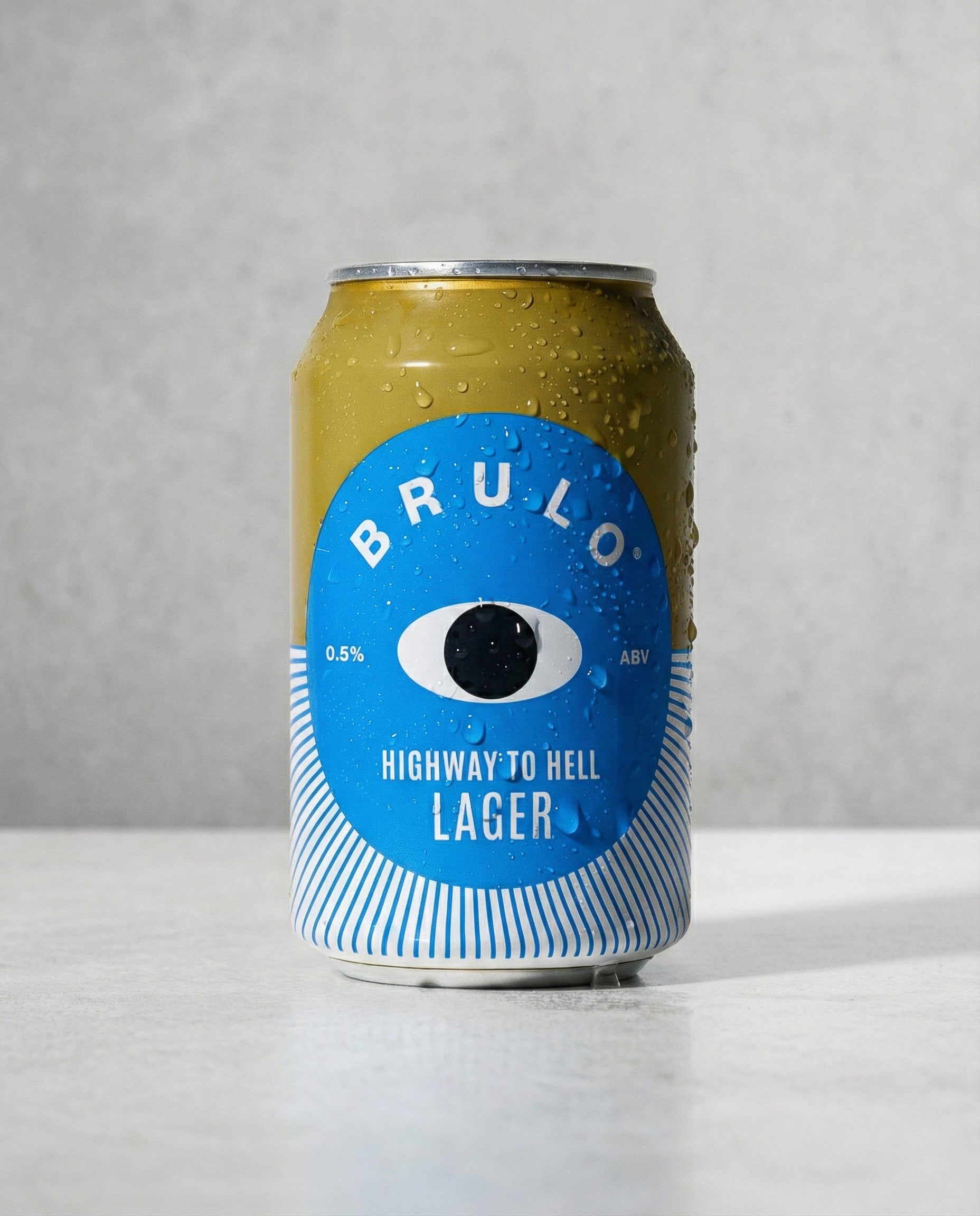 Brulo Highway to Helles 0.5% alcohol-free Helles lager can front view on concrete background