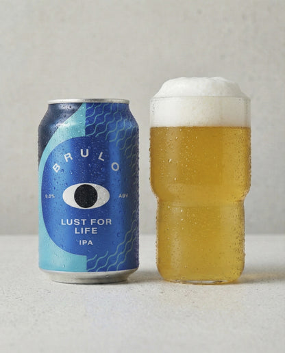 Brulo Lust for Life poured into a glass with foam head