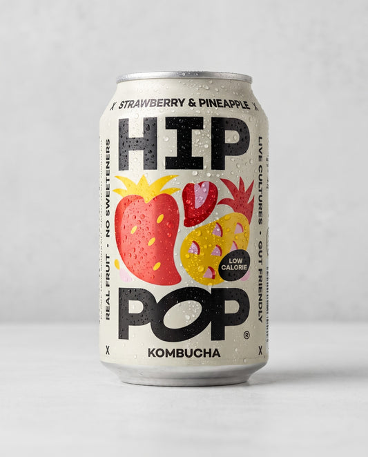 Hip Pop Strawberry and Pineapple kombucha can front view on concrete background