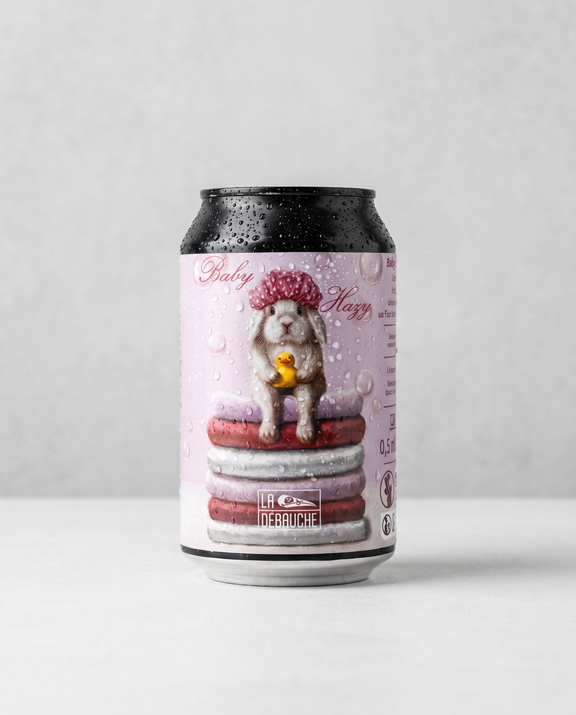 La Débauche Baby Hazy 0.5% alcohol-free can front view on concrete background
