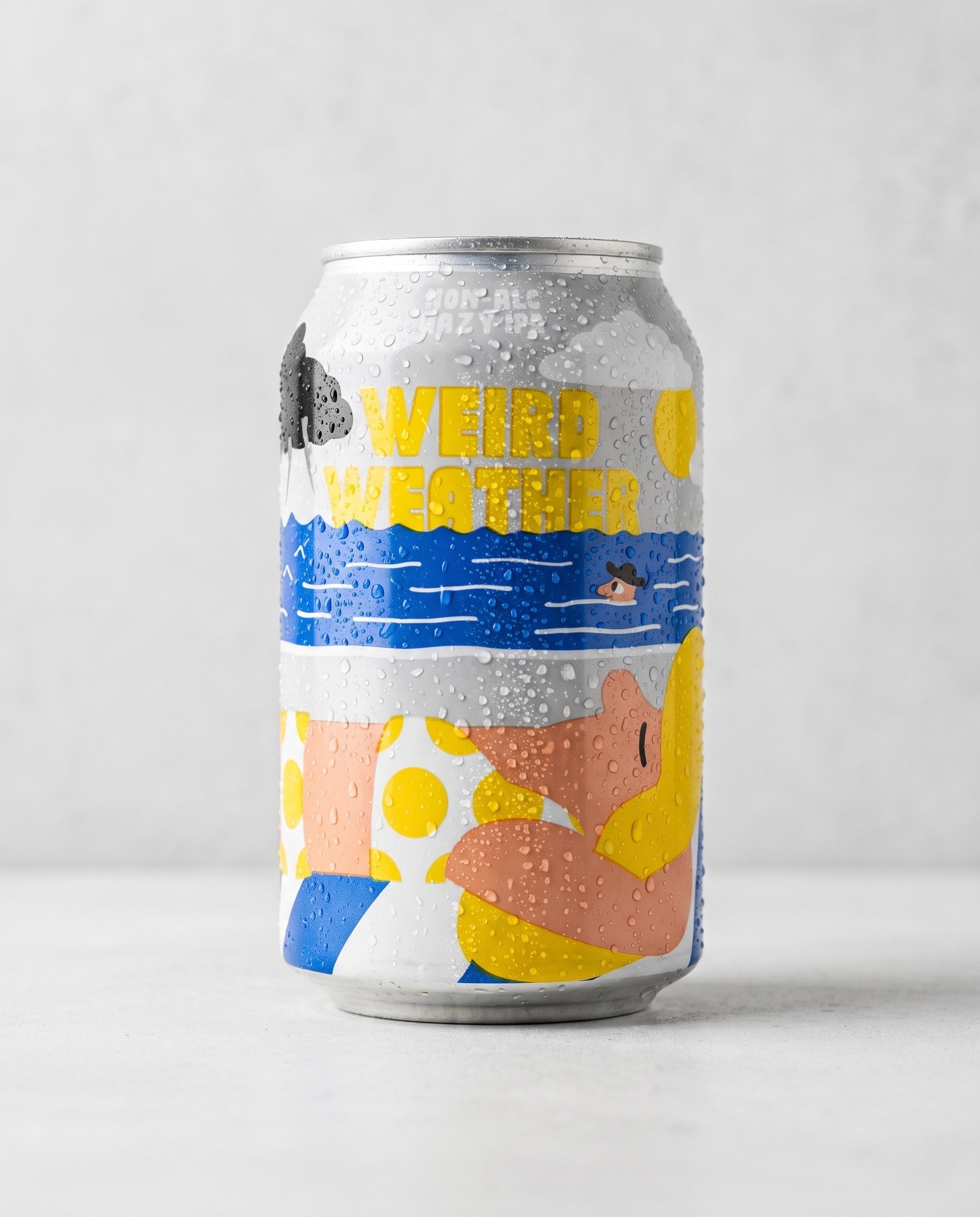 Mikkeller Weird Weather 0.3% non-alcoholic hazy IPA can front view on concrete background
