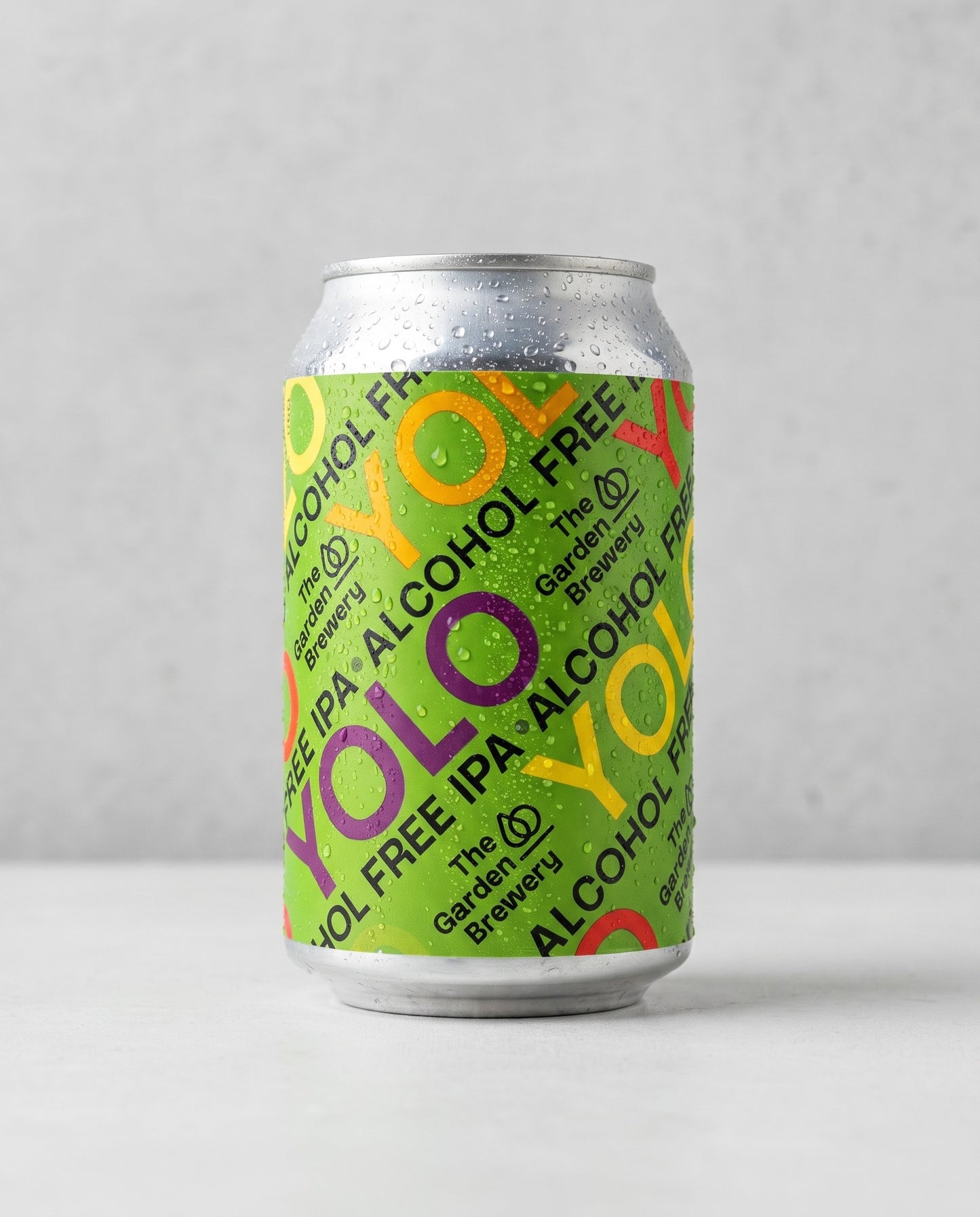 The Garden Brewery YOLO 0.0% alcohol-free DDH IPA can front view on concrete background