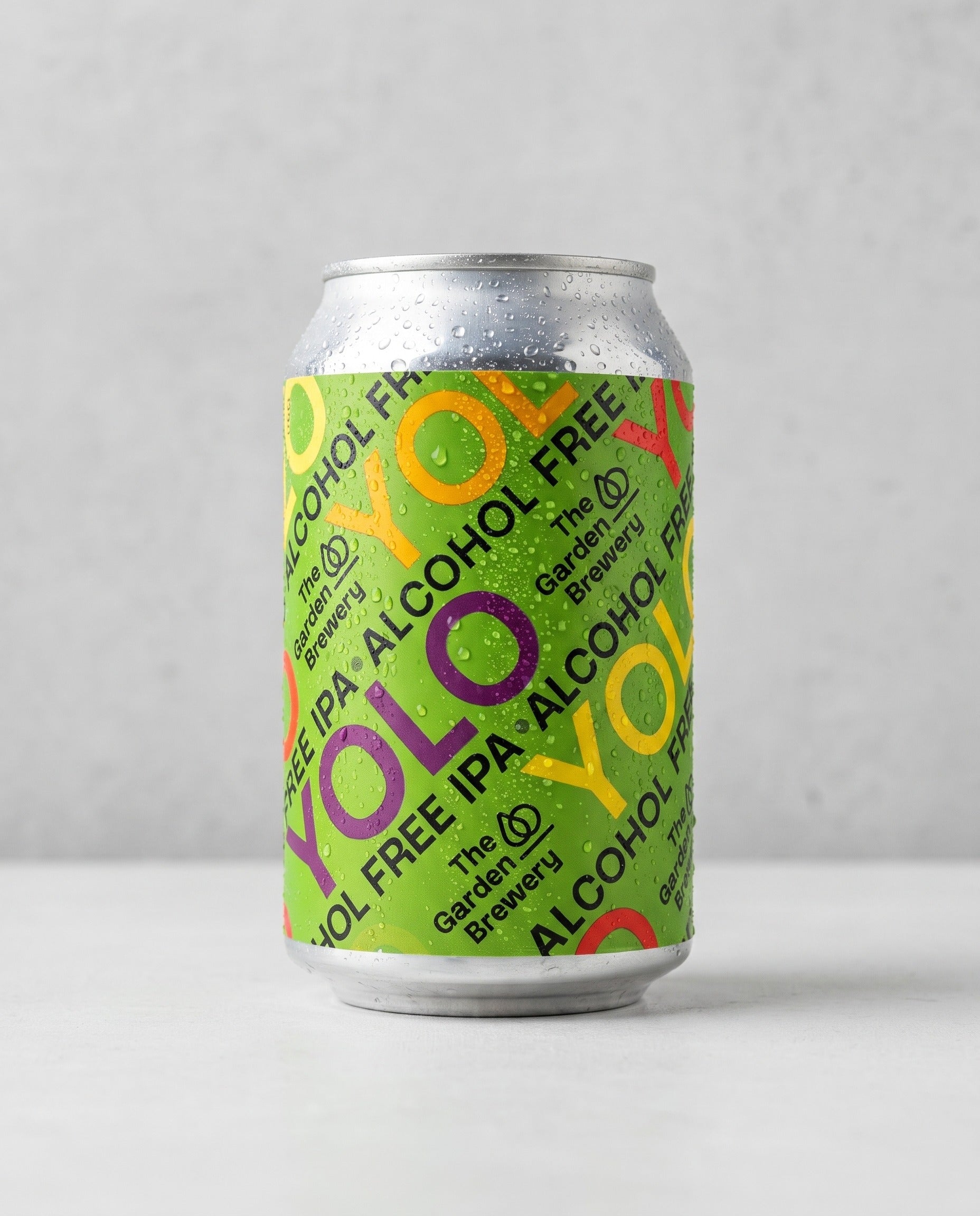 The Garden Brewery YOLO 0.0% alcohol-free DDH IPA can front view on concrete background