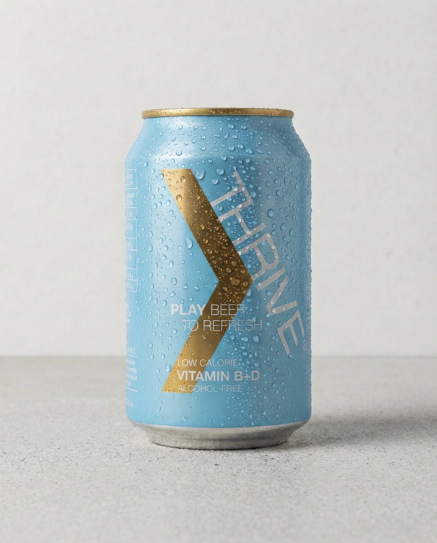 Thrive Play Beer can front view on concrete background