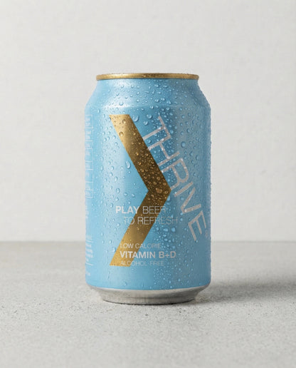 Thrive Play Beer can front view on concrete background