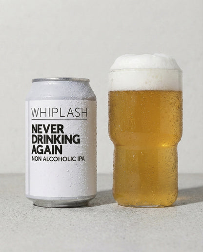 Whiplash Never Drinking Again poured into a glass with foam head